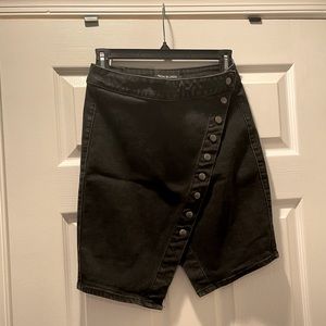 Very cute asymmetrical with button detail black jean skirt